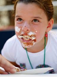 22 Photos: Pie Eating and Bubble Gum Blowing Contests