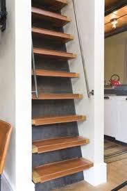 It is designed to be sturdy enough to hold up to 350 pounds. 26 Creative And Space Efficient Attic Ladders Shelterness