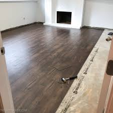 How To Install Vinyl Plank Over Concrete Orc Week 4 5 The Happy Housie In 2020 Vinyl Plank Diy Flooring Vinyl Plank Flooring