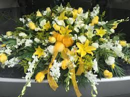Casket Spray Yellow White By Landmark Florist