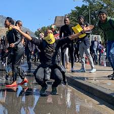 During an illegal protest, protesters damage cape town property. Watch Police Use Water Cannon Fire Stun Grenades To Disperse Cape Town Protesters News24