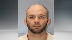 Suspect Charged with Murder of Two Men