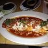 Fish tacos with creamy chipotle sauce and pico de gallo. 1