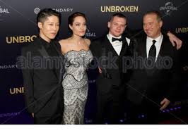 Unbroken (2014) cast and crew credits, including actors, actresses, directors, writers and more. Unbroken Producer And Director Angelina Jolie With Actors Miyavi Jack O Connell And Matthew Baer On The Red Carpet For The World Premiere Of Unbroke Stock Photo Alamy