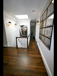 Flooring experts recommend installing flooring boards perpendicular to the floor joists in a house which direction to install hardwood. Hard Wood Floor Direction Change At Kitchen Dinette Medical Office Decor Wood Floors Wood Floor Direction