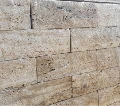 These elegant sandstone garden walls are handmade, skillfully crafted, and perfect for elevated garden decorations. Garden Wall Stone