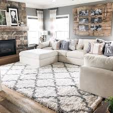 Pretty Farmhouse Living Room With Barn Door White Sectional Couch Trellis Shag R Farm House Living Room Modern Rustic Living Room Farmhouse Decor Living Room