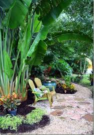 Contemplation Corner Two Chairs With Cushions Water Feature Nearby Nice Walk Gardens Jardin Balinais Beaux Jardins Jardin Tropical