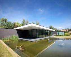 Sift through these stunning, modern glass houses that being int he storybooks and dream about what it would be small but mighty, this design is a great test drive before diving into a larger space full of windows. House Faes Hvh Architecten Archdaily