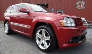 Image result for Flame Red 2006 Jeep