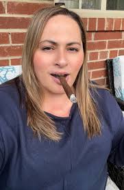 What brand of cigar did K D smoke?