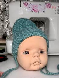 Felted head. I wonder what will happen next? Scroll through the photos