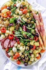 Antipasto can be as simple as cold meats and salami, breads, olives, cheeses, marinated and freshly cooked vegetables to bruschetta, fritters, crostini, frittata and many other dishes either served individually or on a mixed platter which would then be called antipasti, i.e. How To Make An Awesome Antipasto Salad Platter Foodiecrush Con