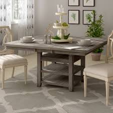 Counter height table with storage and practical butterfly leaf, plus some classic slats design chairs with neutral tan coloured seat dining table + wine rack + some additional storage space, so 2, or even 3 in 1. Adjustable Storage Kitchen Dining Tables You Ll Love In 2021 Wayfair