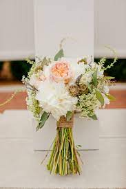 A simple, easy and cheap diy wedding bouquet under 20 minutes and all together costs less than $20. How To Create A Rustic Bridal Bouquet