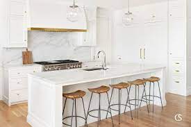 You can stretch the surrounding space to 48 inches or shrink it to 30 inches—but in the latter scenario, you'll also have to check building codes on egress (accessibility). Kitchen Island Ideas Christopher Scott Cabinetry