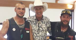 A controversial advertisement promoting maxime bernier's stance on immigration has been stripped from a toronto billboard. Photo Shows Maxime Bernier Posing With Members Of A Violent Anti Immigrant Group At People S Party Event