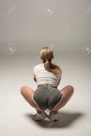 Back View Of Young Girl In Shorts Twerking On White Background Stock Photo Picture And Royalty Free Image Image 135698095