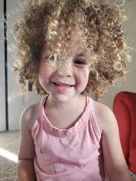 Stylist for curly hair child near Conroe?