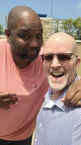 Jimmy Buffett fans sharing stickers and leis