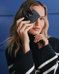 Effortlessly elevated. The relaxed silhouette and gold chain strap make the  Large Bradley Tote Bag as chic as it is functional. Explore more  #LaurenRalphLauren accessories via the link in the bio.