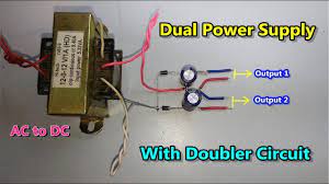 Dc Dual Power Supply With Voltage Doubler Circuit Ac To Dc Converter Basic Electronic Circuits Electronic Circuit Projects Acdc