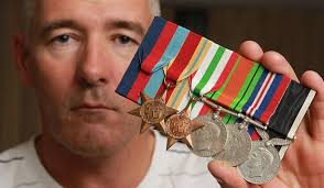 Soldier pleads for return of medal