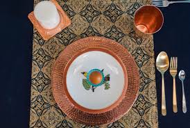 I like that the outer rim of the charger plates are hammered and the center is not, which allows the resting plate to sit securely on the charger. Sertodo Copper Pc 12 Centerpiece Display Plate Hand Hammered 100 Pure Copper 12 Round Charger Plate Charger Plates Plates Serving Dishes