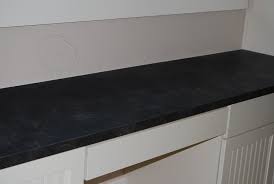 Slate Looking Laminate Flooring Re Laminate Countertop That Looks Like Soapstone Or Slate Laminate Countertops Countertops Wood Kitchen Cabinets