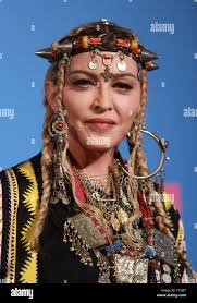Madonna pose for photographers in the press room at the 35th annual MTV  Video Music Awards at Radio City Music Hall in New York City