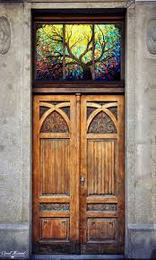Stained Glass Over A Carved Wooden Door Location Unknown Stained Glass Stained Glass Door Stained Wood Trim