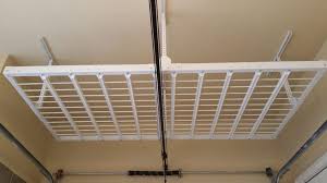 Store those rarely used or seasonal items up, up, up and away with the revolutionary powertrak ceiling system. Ceiling Racks Shively Overhead Garage Lyndon Storage Ideas Gallery Louisville Solutions House N Decor