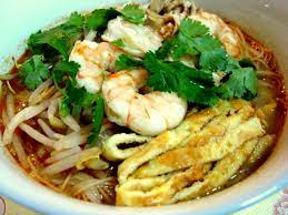 Sarawak laksa is a unique sarawakian breakfast dish of rice vermicelli in a fragrant soup, topped with juicy prawns, tender chicken slices, bean sprouts and julienned omelette. Sarawak Laksa Kelly Siew Cooks