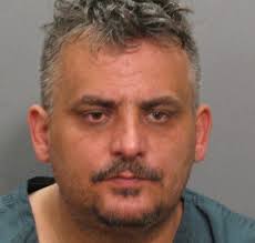 Police asking for help locating man posing as roofing contractor