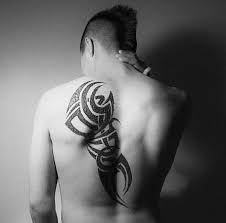 Angry wolf tattoo on back representing anger & rebelliousness. Back Tribal Tattoo Designs Tribal Tattoos For Back