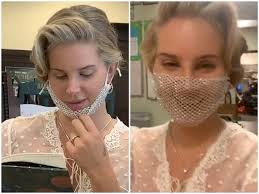 To me lana is the ultimate queen and i feel so lucky to be living in the time period with her music. Lana Del Rey Roasted For Wearing Mesh Mask To Book Signing In L A What The F K Are You Doing