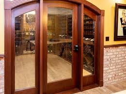 Glass doors and walls provide a clean aesthetic that showcases the collection with timeless simplicity. Pin On Wine Cellar Doors