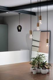 Pastel Colours And Subtle Grids Break Up Open Plan Hair Salon In Osaka Interior Design Color Schemes Salon Interior Design Interior Design Color