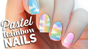 If you're trying the rainbow nail art design but you want it in a subtle way, you can definitely choose this smokey design. Pastel Rainbow Nail Art Design Youtube