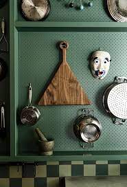 Julia Child S Pegboard Is Back And Better Than Ever In This Green Kitchen Kennedy Nolan Peg Board Kitchen Organization