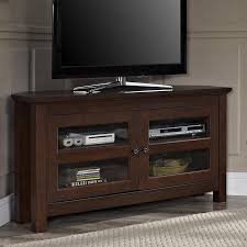 The triangle shape is an elegant way to create a useful space in an other wise unused corner. Walker Edison Brown Corner Tv Stand Accommodates Tvs Up To 50 In In The Tv Stands Department At Lowes Com