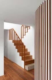 This design is one of the wooden stair railing ideas that highlight the natural grain of woods and its carvings effectively. Simple Wooden Stairs Staircase Design Wooden Staircase Railing Stairs Design