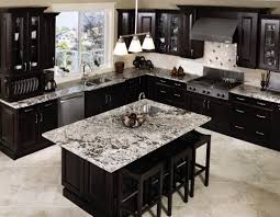 Black appliances camouflaged on the glossy cabinets in this sleek kitchen with white walls. 25 Traditional Dark Kitchen Cabinets Godfather Style