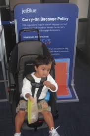 We Attached Our Car Seat To A Luggage Pull With Bungie Straps Was The Best Way To Cart Our Spirited Toddler Thru The Raising Kids Adventure Baby Carry On Bag