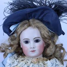 A reproduction Gina Saunders 'H' bisque' head Bebe doll, 1990,