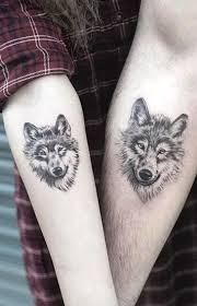 Red heart on the hands. 20 Most Beautiful Couple Tattoo Designs That You Love Forever