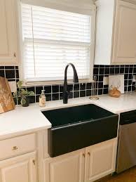 Black kitchen sinks, countertops, faucets and kitchen accessories in black color. Renovating An Out Of Date Kitchen With Sinkology Vibe Sinkology