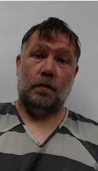 Shelbyville man accused of strangling family member, injuring police  officer