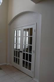 Enclosed Archway And Installed French Doors To Create A Study While Maintaining The Original Arch Th Installing French Doors French Doors Arched Interior Doors
