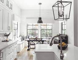 White Kitchen Bronze Hardware Black Accents White Farmhouse Kitchens Farmhouse Kitchen Design Farmhouse Style Kitchen